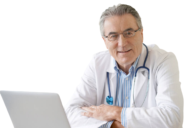 A doctor sitting at his laptop in front of the computer.